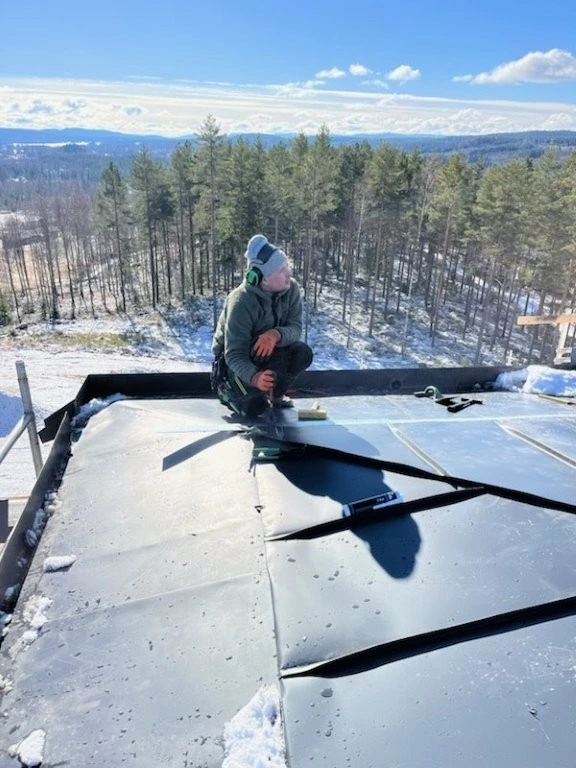 Bild på snöskottning